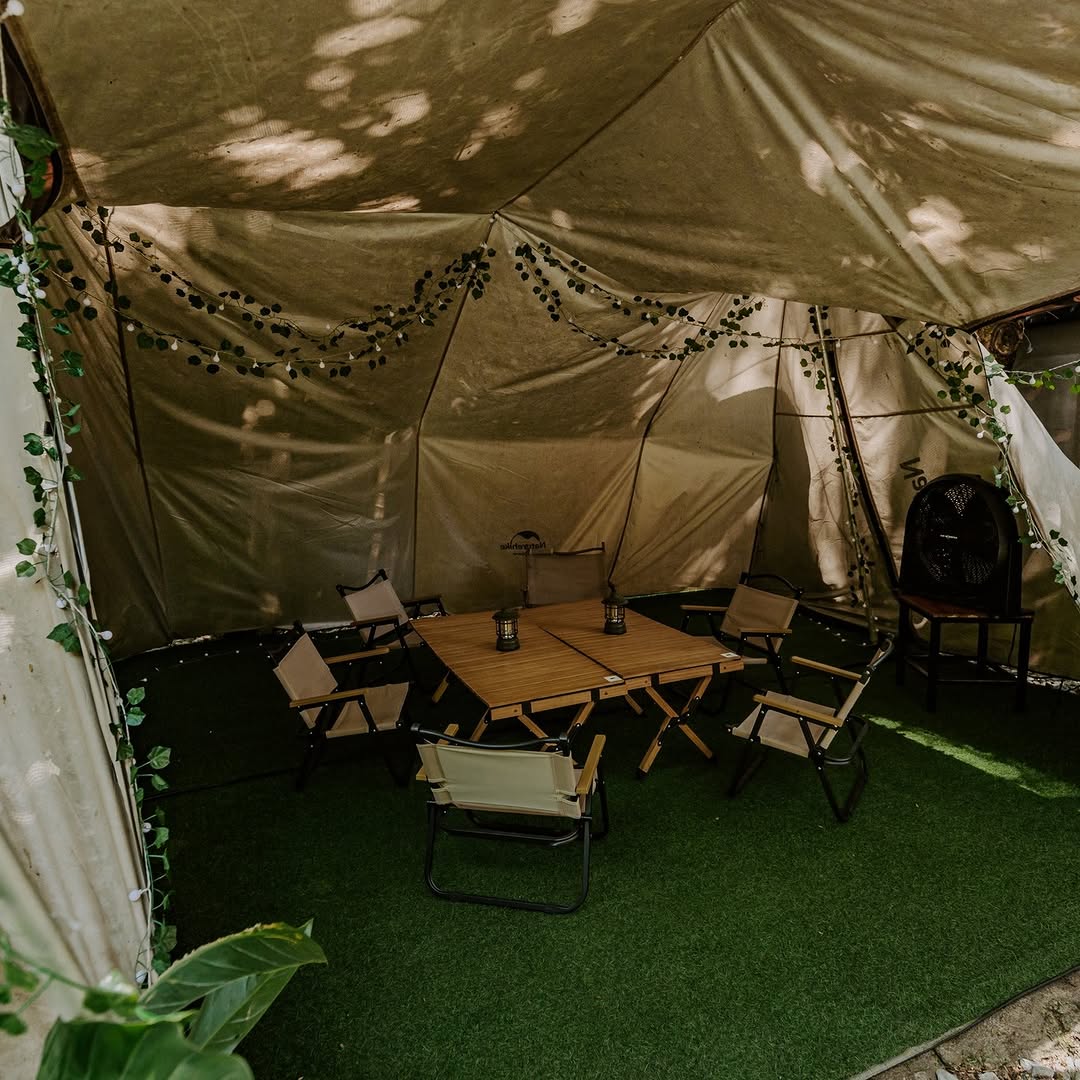 Outdoor camping setup and overlanding vehicles at Kamp Lilim event